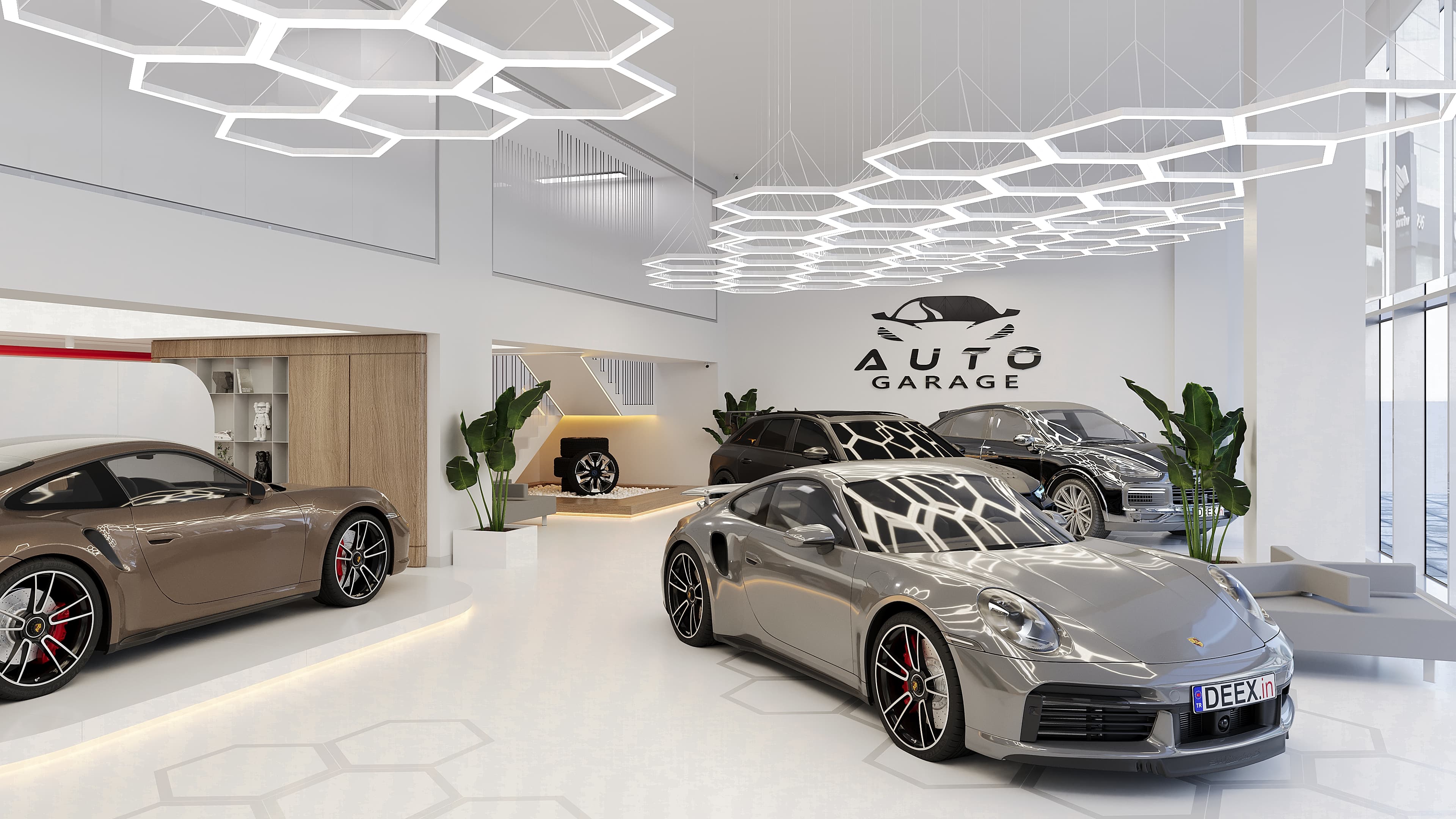 Wide showroom with hexagonal ceiling lights and Auto Garage branding