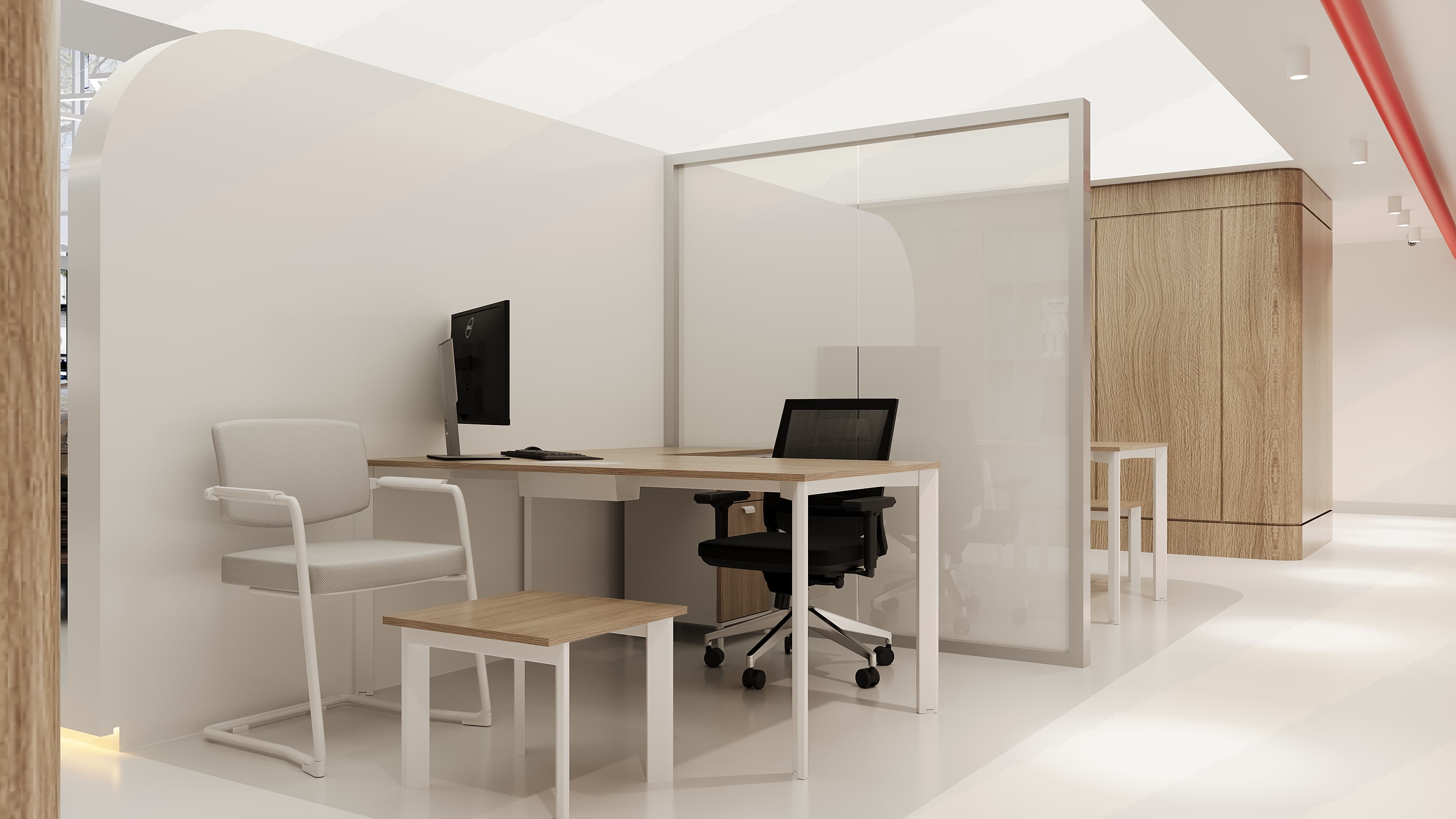 Office workstation area with glass partitions and task lighting