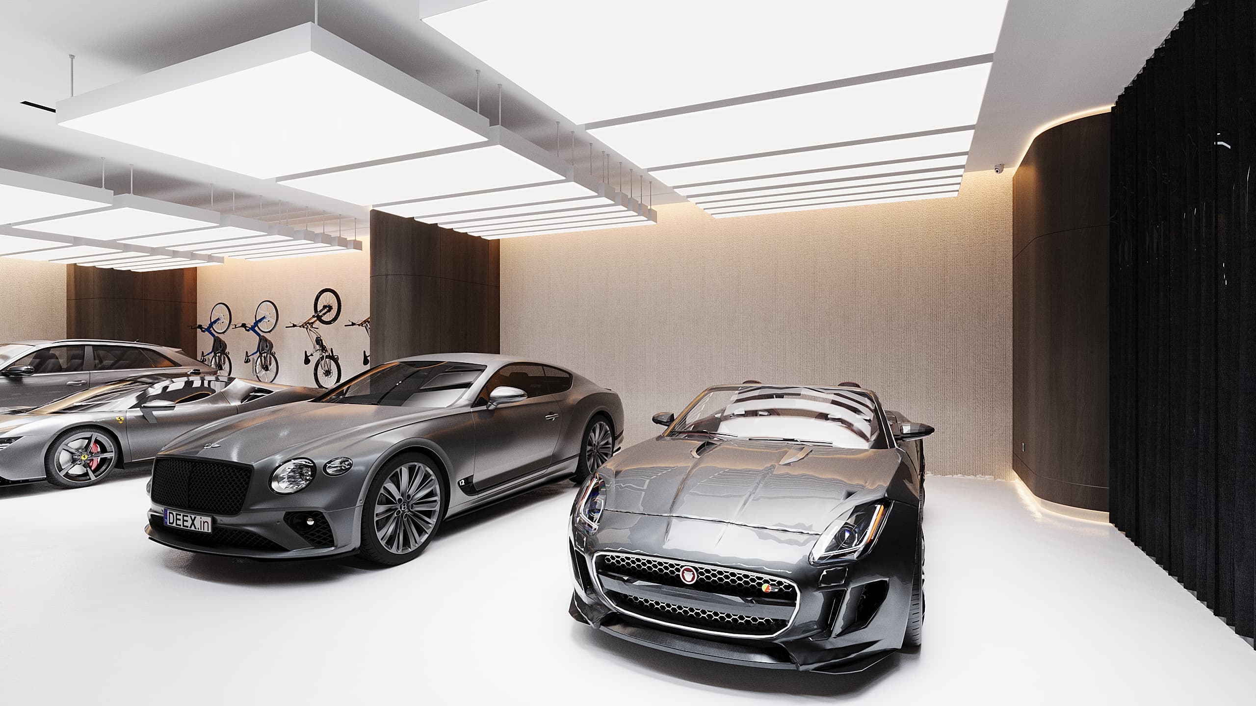 Basement level with Jaguar and Bentley under linear ceiling lights