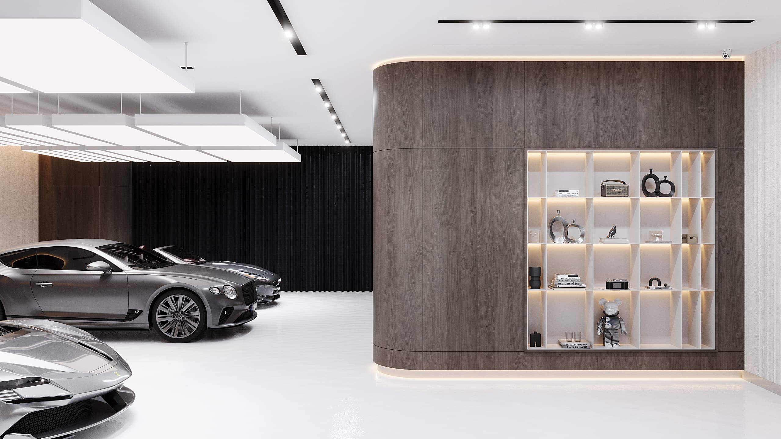 Display shelving with decorative objects beside parked cars