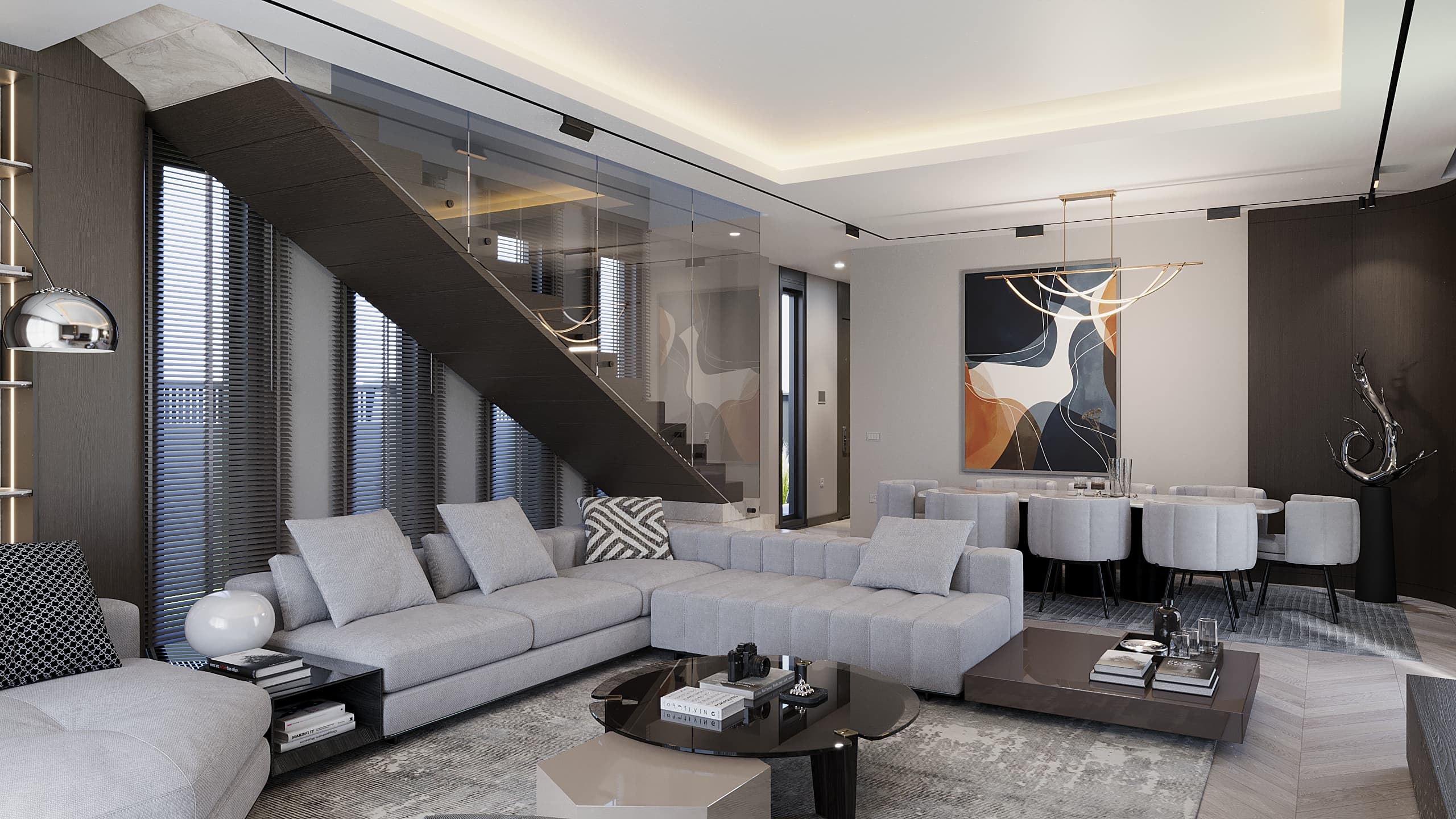 Open-plan living and dining with abstract art and staircase