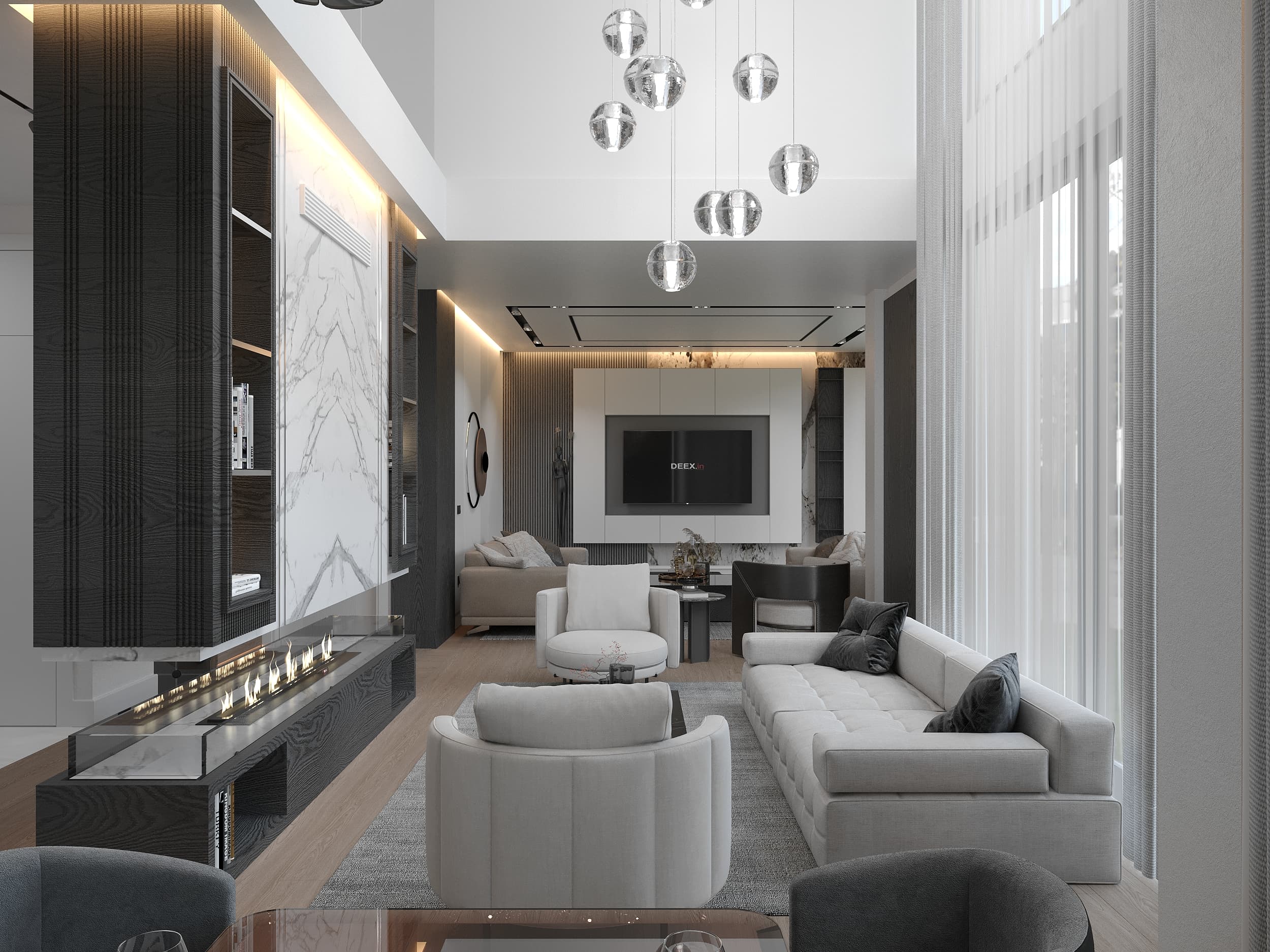 Full living room with double-height windows, pendant cluster, and seating